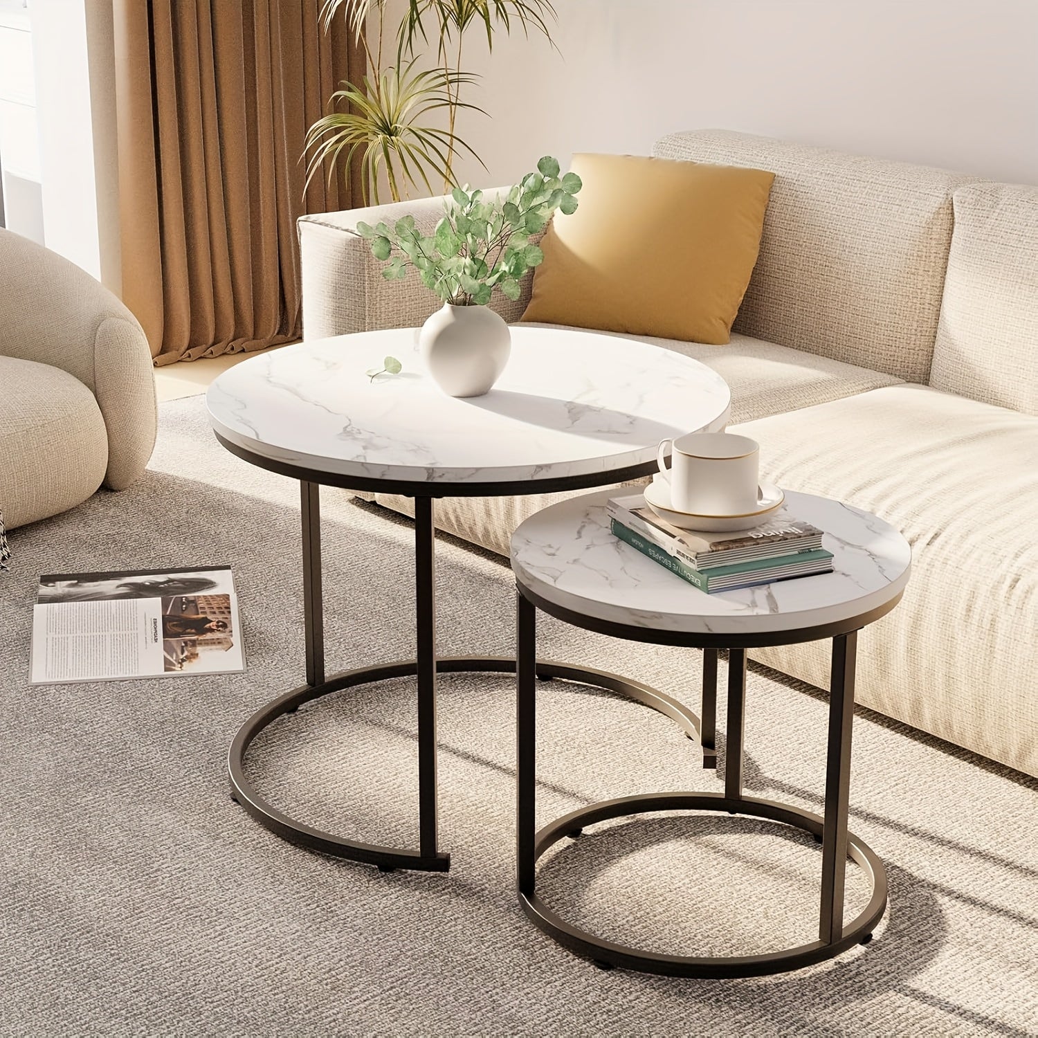 Set of Two Circular Nesting Tables Featuring a White Faux Marble Top And a Golden Frame, Perfect for Modern Living Rooms Or Bedrooms with an Industrial Touch
