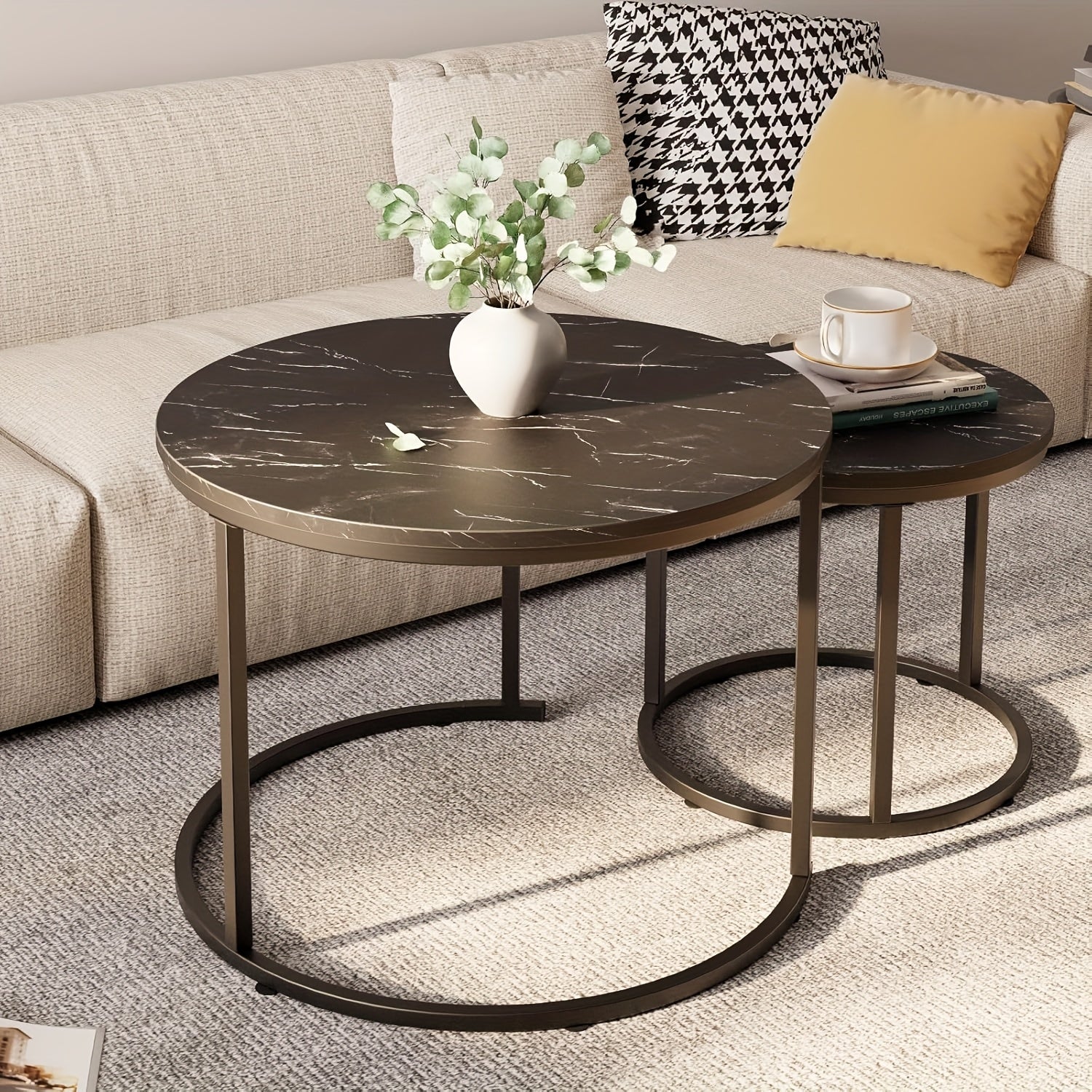 Set of Two Circular Nesting Tables Featuring a White Faux Marble Top And a Golden Frame, Perfect for Modern Living Rooms Or Bedrooms with an Industrial Touch